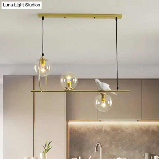 Modern Clear Glass Pendant Light Fixture With White Bird - Global Island Lamp Gold Trim 3 Heads
