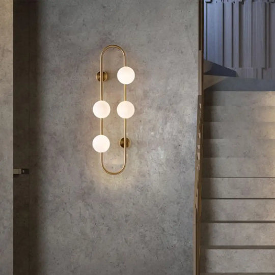 Modern Gold Oblong Sconce Wall Light With 4-Metal Heads And Milky Glass Shade
