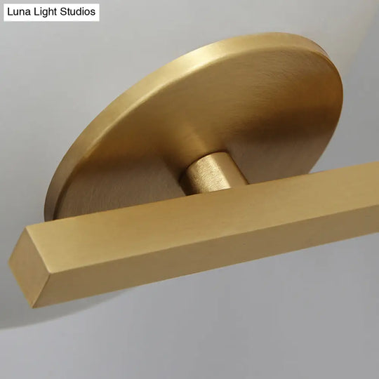Modern Milk Glass Wall Sconce With Brass Finish