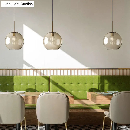 Modern Minimalist Cognac Glass Pendant Light - Stylish 1-Light Lighting For Dining Room Table