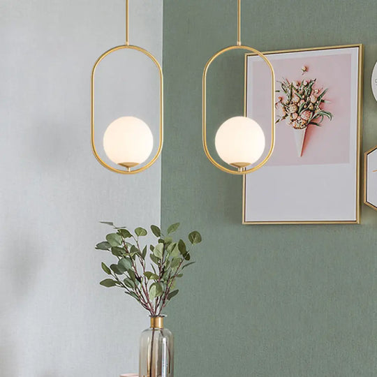 Modern Opal Glass Globe Pendant Light With Gold Finish And Oval Frame / Small