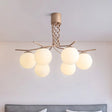 Modern Spiral Chandelier Pendant Light With 6 Iron Heads In Rose Gold And Sphere White Glass Shade