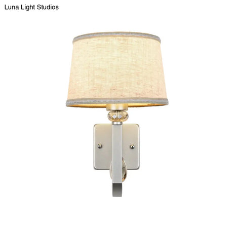 Modern Wall Sconce With Fabric Drum Shade And Silver Metal Backplate