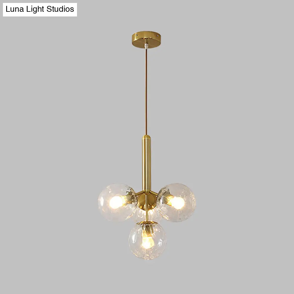 Modernist Gold Globe Pendant Light Fixture - Clear Water Glass 4 Heads