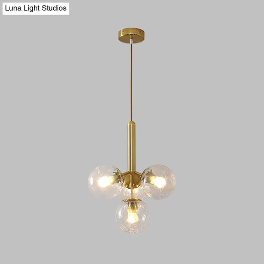 Modernist Gold Globe Pendant Light Fixture - Clear Water Glass 4 Heads