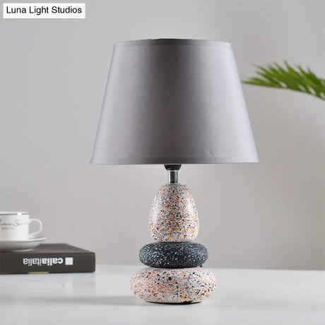 Modernist Led Night Table Lamp In Black/Grey Ceramic Stone Shape With Fabric Shade
