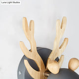 Modernist Metal Wall Sconce With Antler Design And Cylinder Shape For Bedroom Lighting