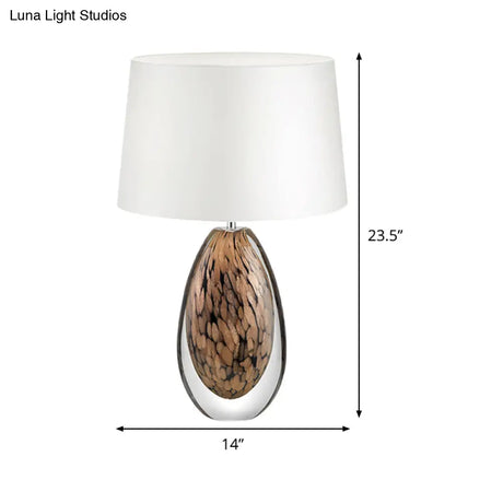 Modernist White Fabric Desk Lamp With Teardrop Brown Glazed Crystal Base - 1 Head Tapered Table