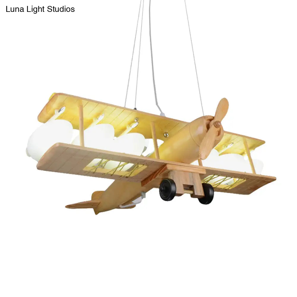 Nordic Beige Wood Pendant Light: Glider Shaped Hanging Light For Kindergarten
