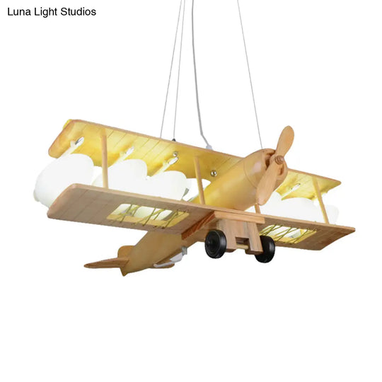 Nordic Beige Wood Pendant Light: Glider Shaped Hanging Light For Kindergarten