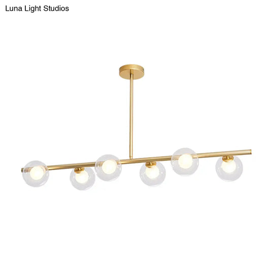 Nordic Metal 6-Head Linear Island Light With Gold Finish And Clear Glass Globes