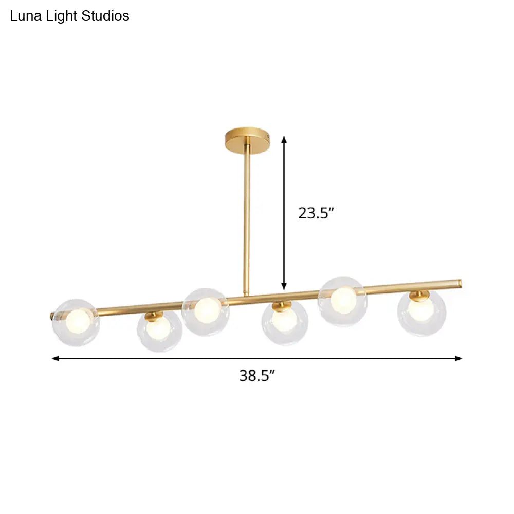 Nordic Metal 6-Head Linear Island Light With Gold Finish And Clear Glass Globes