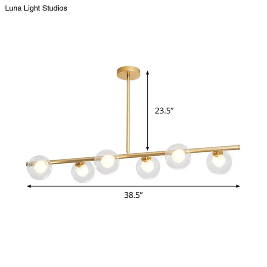 Nordic Metal 6-Head Linear Island Light With Gold Finish And Clear Glass Globes