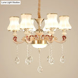 Nordic Metal Hanging Pendant Light With Scrolled Arm And Flared Glass Shade In Gold - Ideal For
