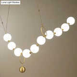 Nordic Opal Glass Dining Room Chandelier - 10-Light Round Hanging Ceiling Light with Elegant Necklace Design in Gold