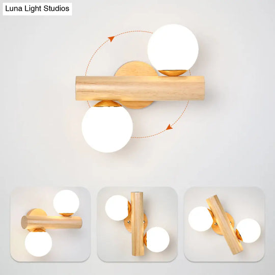 Nordic White Glass Ball Rotating Wall Lamp With Wood Mount - Ideal For Bedroom Lighting
