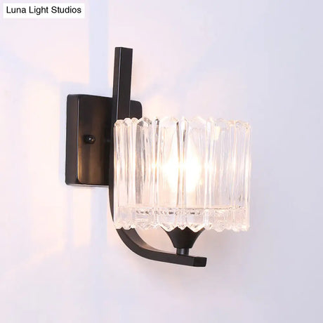 Post-Modern Black Metal Wall Mount Light With Clear Crystal Shade - Trapezoid/Flower/Drum Design