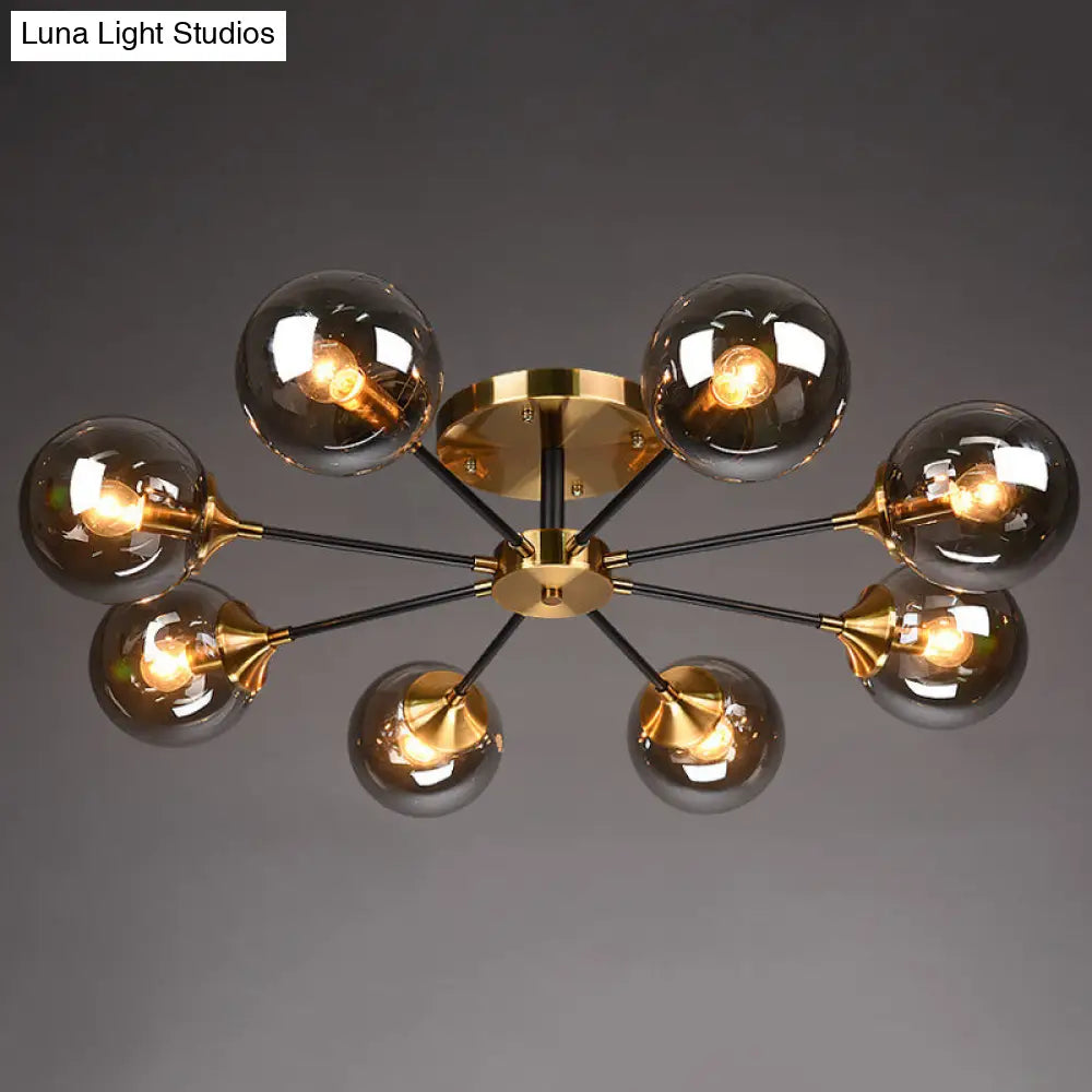 Postmodern Brass Flush Mount Light With Burst Design And Glass Ball For Living Room