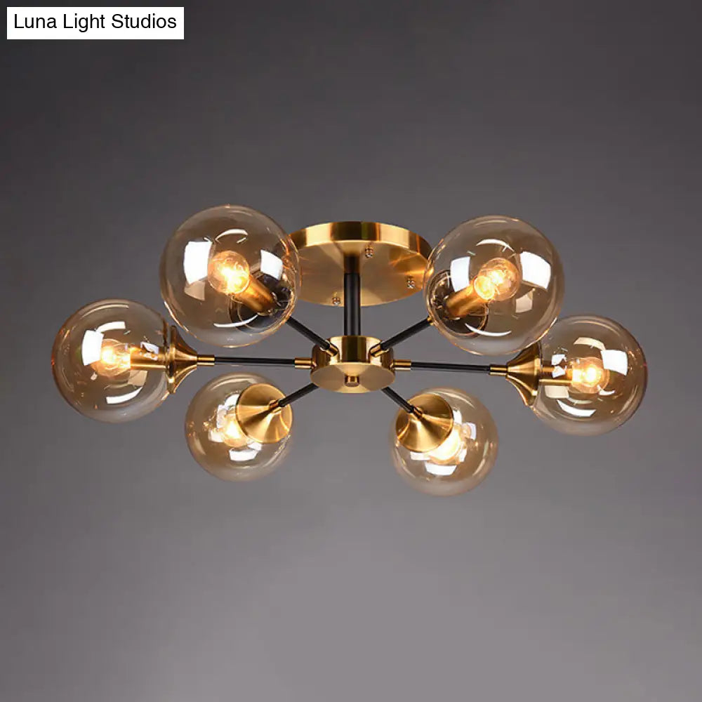 Postmodern Brass Flush Mount Light With Burst Design And Glass Ball For Living Room