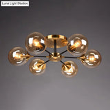 Postmodern Brass Flush Mount Light With Burst Design And Glass Ball For Living Room