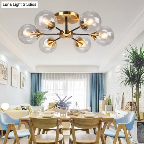 Postmodern Brass Flush Mount Light With Burst Design And Glass Ball For Living Room