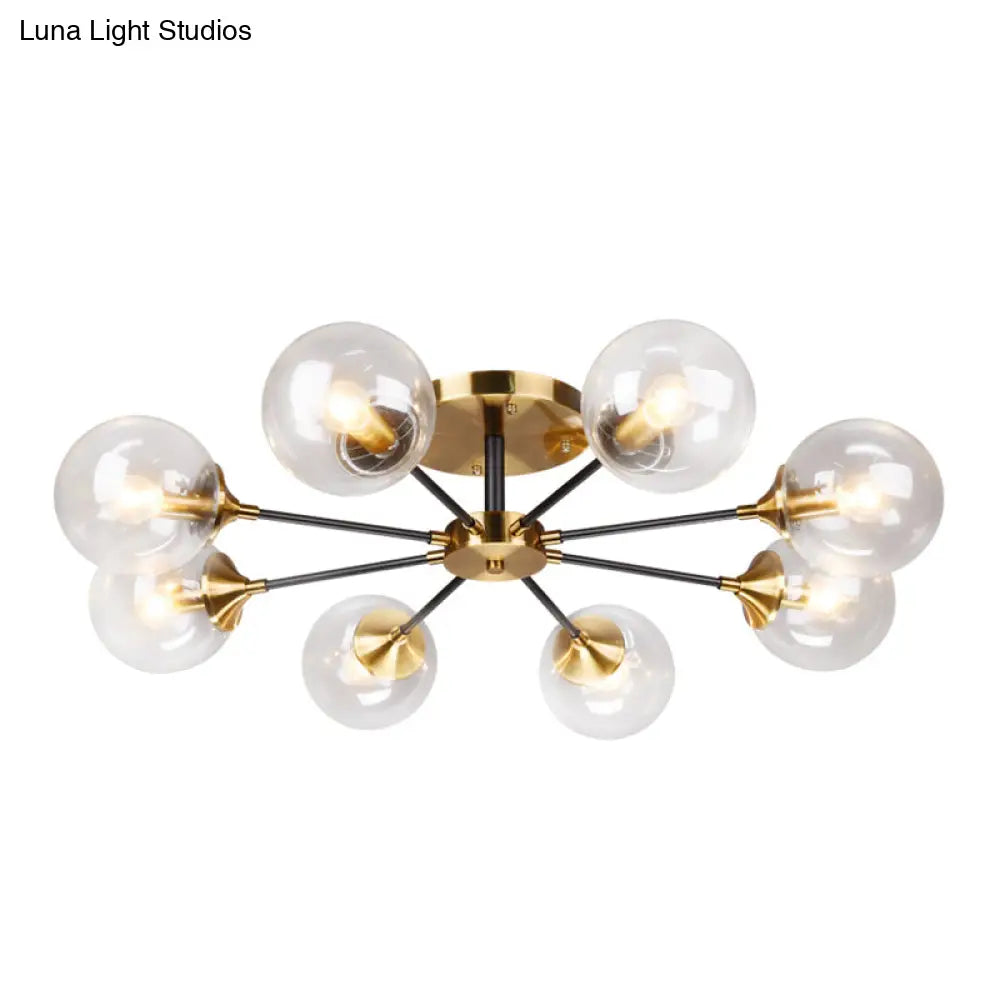 Postmodern Brass Flush Mount Light With Burst Design And Glass Ball For Living Room