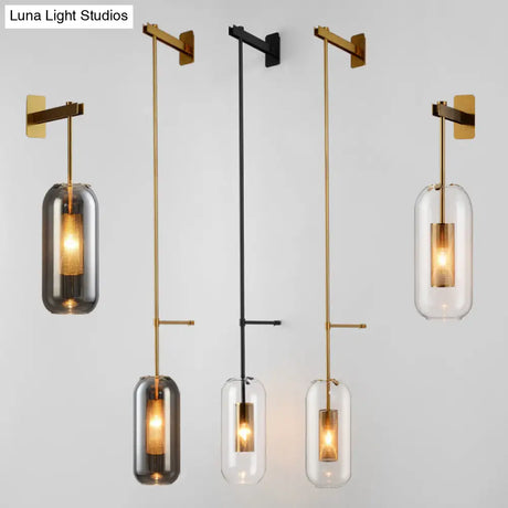 Postmodern Capsule Wall Hanging Light Clear Glass Bedside Lamp 1 Bulb Interior Mesh Guard Black/Gold
