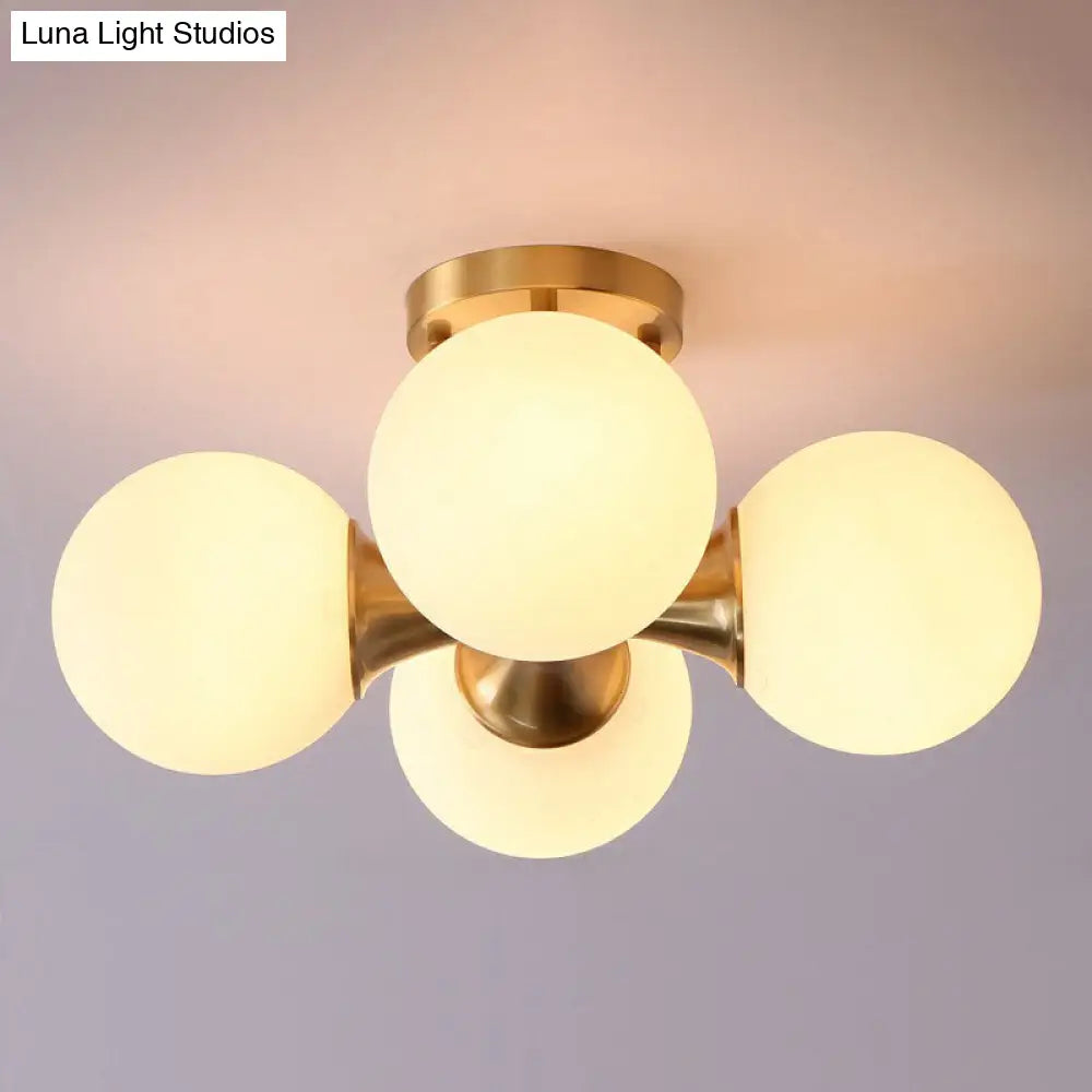 Postmodern Gold Finish Flush Mount Ceiling Light With White Glass Ball