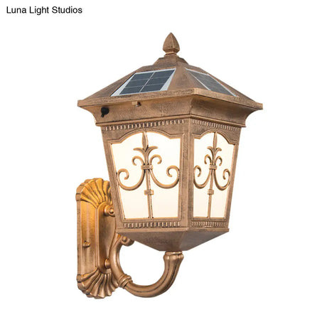 Quartet Religion Wall Lamp: Rustic 1-Light Sconce With Solar Panel Brass Finish