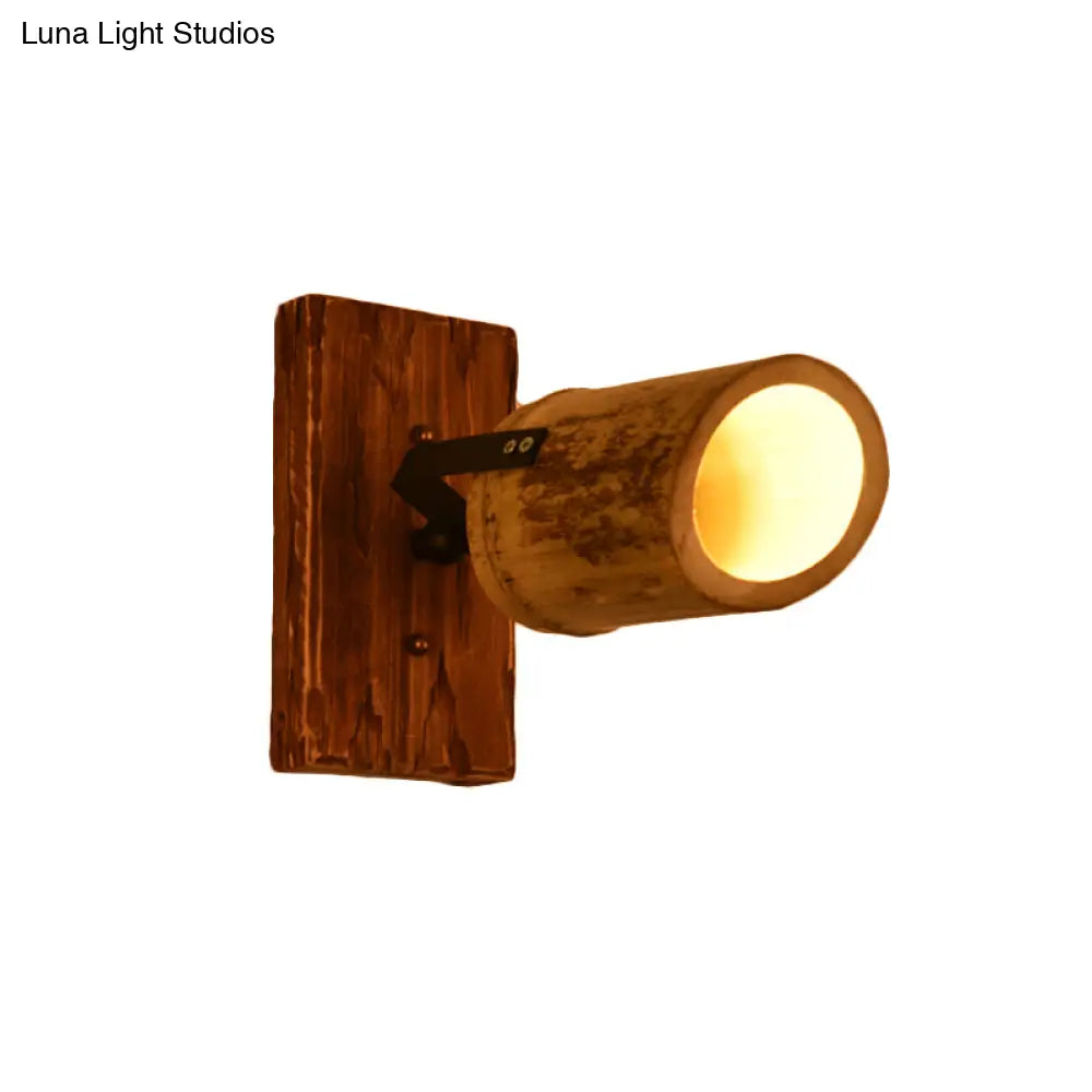 Rustic Bamboo Wall Sconce With Linear Wood Backplate