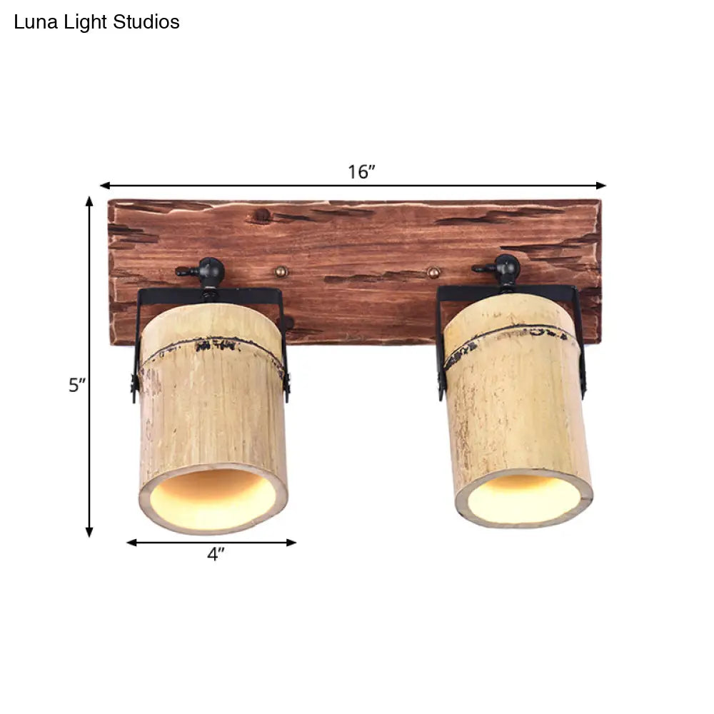 Rustic Bamboo Wall Sconce With Linear Wood Backplate