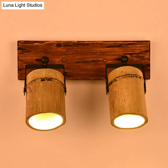Rustic Bamboo Wall Sconce With Linear Wood Backplate