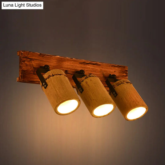 Rustic Bamboo Wall Sconce With Linear Wood Backplate