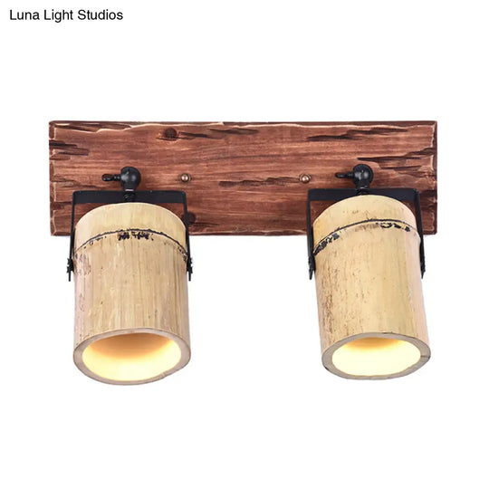 Rustic Bamboo Wall Sconce With Linear Wood Backplate