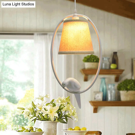Rustic Beige Pendant Light With Bird Accent - Stylish Oval Metal Ceiling For Hotels

This Improved