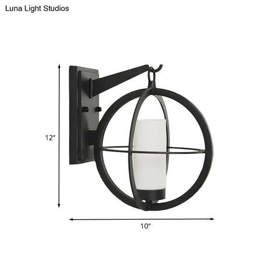 Rustic Black Cylinder Sconce With Frosted Glass And Metal Cage