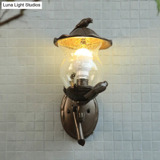 Rustic Black Gourd Shaped Garden Wall Lamp - 1-Light Seedy Glass Lantern Sconce With Charming Bird