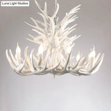 Rustic Resin Antler Chandelier - Artfully Crafted Hanging Light With Exposed Bulb Design