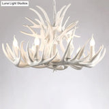 Rustic Resin Antler Chandelier - Artfully Crafted Hanging Light With Exposed Bulb Design