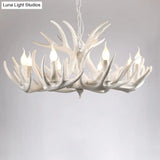 Rustic Resin Antler Chandelier - Artfully Crafted Hanging Light With Exposed Bulb Design