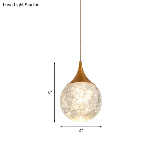 Sleek Crystal Seeded Suspension Lamp: Elegant Bedroom Lighting Solution