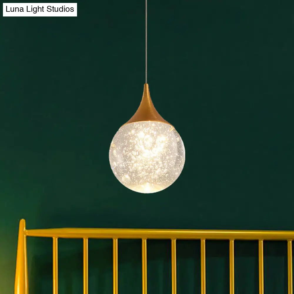 Sleek Crystal Seeded Suspension Lamp: Elegant Bedroom Lighting Solution Coffee
