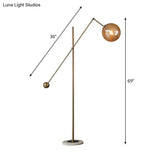 Simplicity 1-Light Bronze Amber Glass Sphere Floor Lamp With Balance Arm