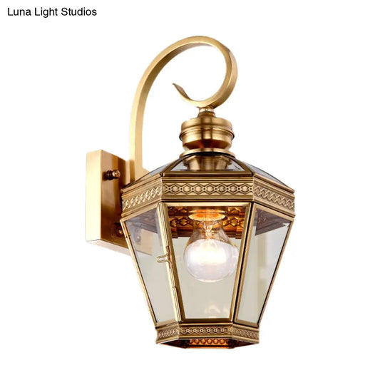 Sleek 1-Light Outdoor Brass Wall Sconce With Clear Glass Lantern Shade