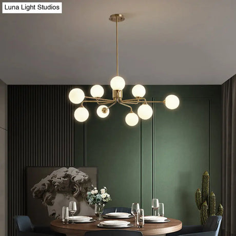 Sleek Modos Chandelier: Simplicity White Glass Ceiling Light With Brass Finish For Living Room