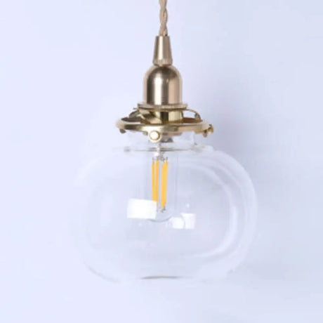 Stylish Oval Pendant Light In Brass With Glass Shade - Perfect For Cloth Shop Clear