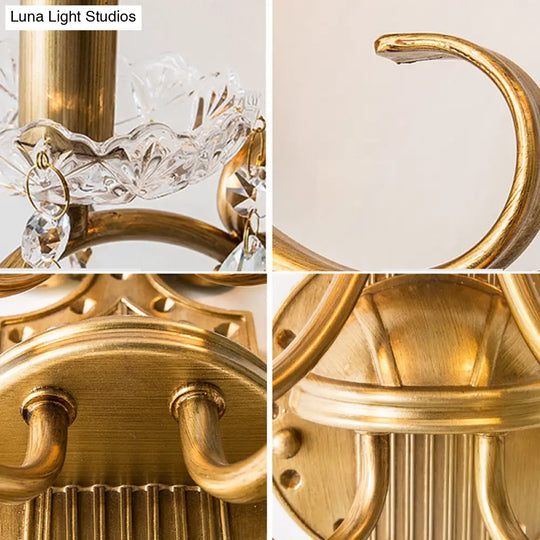 Traditional Crystal Candle Wall Sconce With Antiqued Brass Finish And Scroll Arm