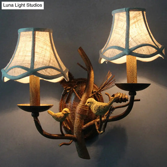 Traditional Flared Brown Fabric Wall Light With Decorative Bird And Pinecone - Perfect For