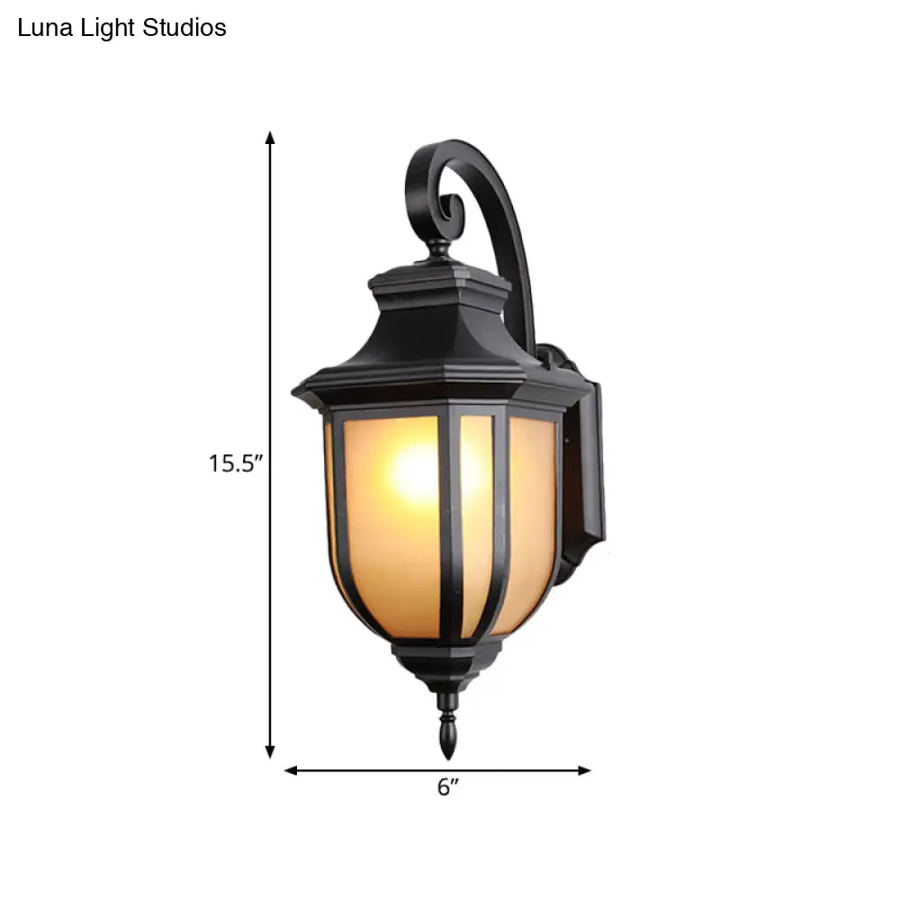 Traditional Style 1-Light Wall Mount Light Fixture - Black Lamp With Tan Glass Urn Shade