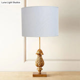 Traditional Style Wooden Desk Lamp With Gold Carvings Fabric Shade - Guest Room Nightstand Light